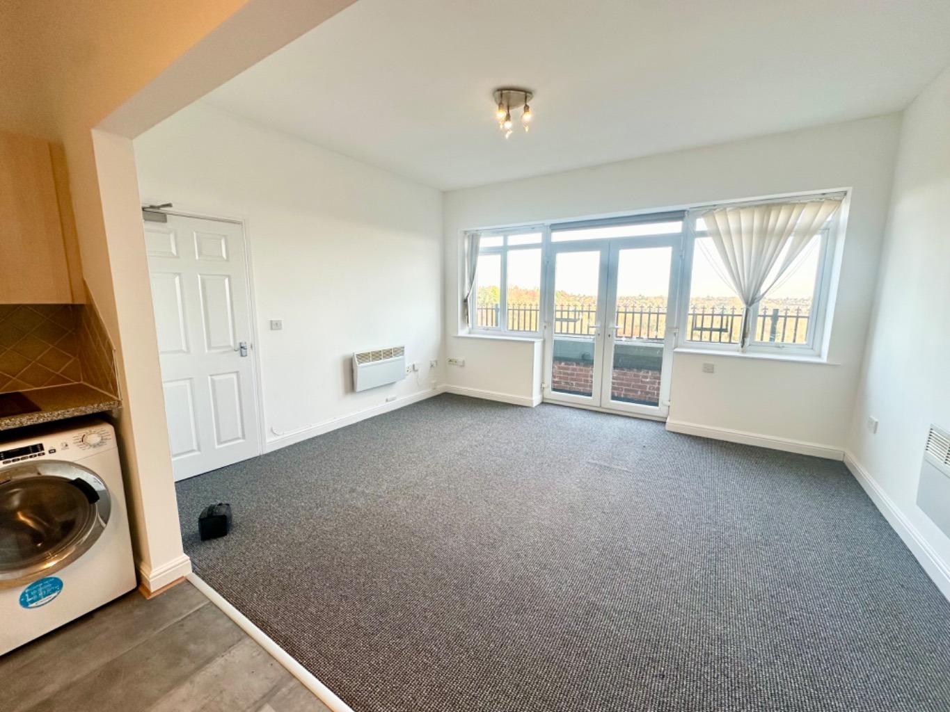 9.23% gross yield investment opportunity! Tenanted top floor apartment with balcony with parking...