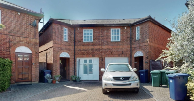 A modern four-bedroom semi-detached home is situated in a gated development close to Golders Green..