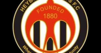 Heybridge Swifts Player supported by Church & Hawes nets a superb header