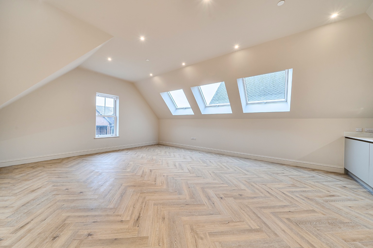 Spacious Top-Floor 1-Bedroom Apartment in New Cheam Development